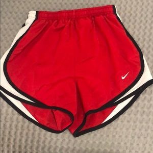 Red nike shorts